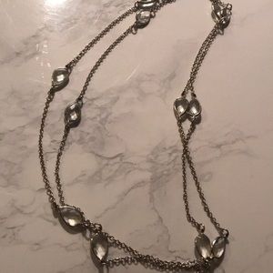 Long silver colour costume necklace